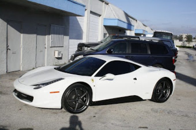 Ferrari 458 3M Carbon Fiber Car Wrap on Mirror, Lower Side Rocker Panel, Rear Trunk Lid, & Door Handles by 3M CERTIFIED Car Wrap Solutions in Fort Lauderdale, Florida