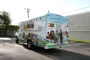 Shuttle bus vinyl vehicle wrap